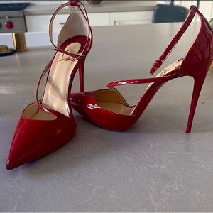 Christian Louboutin red heel.